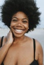 Beautiful plus size African American woman at the beach