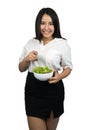 Beautiful plus size Asian woman holding a bowl of salad