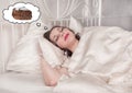 Beautiful plus size woman dreaming about cake Royalty Free Stock Photo