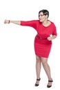 Beautiful plus size woman in red dress beating something isolate