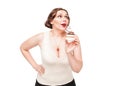 Beautiful plus size woman temptating with pastry Royalty Free Stock Photo