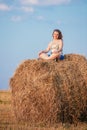 Beautiful Plus Size Young Woman In Shirt Sit Near Hay Bales In Summer Royalty Free Stock Photo