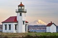 The Beautiful Point Robinson Lighthouse with Mount Rainier in the Backdrop during Sunset Royalty Free Stock Photo