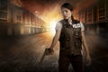 Beautiful police woman holding gun Royalty Free Stock Photo