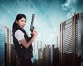 Beautiful police woman holding gun Royalty Free Stock Photo