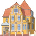 Beautiful Polish yellow brick house with a tiled roof. Royalty Free Stock Photo