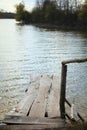 Wooden ladder, wooden bridge, Pond river pond nature sky in reflection. reflections in water, Lake View Royalty Free Stock Photo