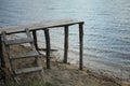 Wooden ladder, wooden bridge, Pond river pond nature sky in reflection. reflections in water, Lake View Royalty Free Stock Photo