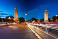 Beautiful Pont Alexandre III bridge over the Seine river at dusk, Paris. France Royalty Free Stock Photo