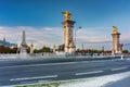 Beautiful Pont Alexandre III bridge over the Seine river at sunset, Paris. France Royalty Free Stock Photo