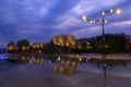 A beautiful  pool in landscape park, at night against a background of beautiful clouds. Trees are reflected in the water Royalty Free Stock Photo