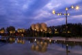 A beautiful pool in landscape park, with scenic lighting at night against a background of beautiful clouds. Trees are Royalty Free Stock Photo