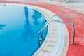 A beautiful pool with steps near the sea on nature background Royalty Free Stock Photo