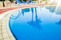 beautiful pool with steps near the sea on nature background Royalty Free Stock Photo