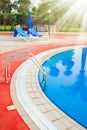 beautiful pool with steps near the sea on nature background Royalty Free Stock Photo