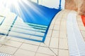 beautiful pool with steps near the sea on nature background Royalty Free Stock Photo