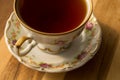 Beautiful porcelain cup of tea on the table Royalty Free Stock Photo