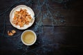 Beautiful porcelain white chinese cup of herbal tea and saucer w Royalty Free Stock Photo