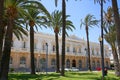 The beautiful Port Authority of Cartagena building under the palm trees, Murcia, Spain