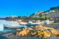 Beautiful port of Nafplio city in Greece with small boats, palm trees.