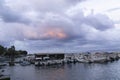 Beautiful port scene blue dusk and orange sky with clouds