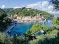 The beautiful Portofino panorama with colorfull houses, boats and yacht in little bay harbor. Liguria, Italy