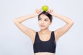 Beautiful portrait asian woman smiling holding green apple fruit and body diet with fit isolated on white background Royalty Free Stock Photo