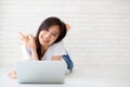 Beautiful portrait asian young woman working online laptop with Royalty Free Stock Photo