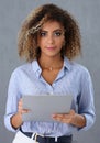 Beautiful portrait of black hispanic woman holding clipboard with business documents Royalty Free Stock Photo