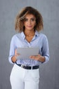 Beautiful portrait of black hispanic woman holding clipboard with business documents Royalty Free Stock Photo