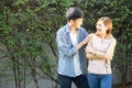 Beautiful portrait couple looking each others eyes and smiling with happy, young asian man and woman relation with love dating Royalty Free Stock Photo