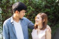 Beautiful portrait couple looking each others eyes and smiling with happy, young asian man and woman relation with love dating Royalty Free Stock Photo