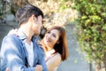 Beautiful portrait couple looking each others eyes and smiling with happy, young asian man and woman relation with love dating Royalty Free Stock Photo