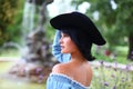 Beautiful portrait of cowgirl with black hat Royalty Free Stock Photo