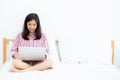 Beautiful portrait freelance asian young woman sitting relax and leisure working laptop computer internet online