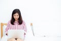 Beautiful portrait freelance asian young woman sitting relax and leisure working laptop computer internet online.