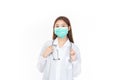 Beautiful portrait friendly asian female doctor or nurse in medical mask at medical clinic isolated on white background. Mask to Royalty Free Stock Photo