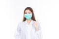 Beautiful portrait friendly asian female doctor or nurse wear medical mask at medical clinic isolated on white background. Mask to Royalty Free Stock Photo