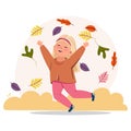 Beautiful portrait of a happy blond girl enjoying the autumn and throwing colourful leaves Royalty Free Stock Photo