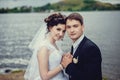 Beautiful portrait of happy bride and groom on the background of nature. Newlyweds close-up Royalty Free Stock Photo