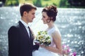 Beautiful portrait of happy bride and groom on the background of nature. Newlyweds close-up Royalty Free Stock Photo