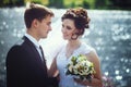Beautiful portrait of happy bride and groom on the background of nature. Newlyweds close-up Royalty Free Stock Photo
