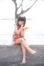 Beautiful portrait little girl asian of a smiling standing at swimming pool Royalty Free Stock Photo