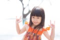 Beautiful portrait little girl asian of a smiling standing at swimming pool Royalty Free Stock Photo