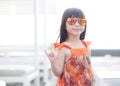 Beautiful portrait little girl asian of a smiling standing at swimming pool Royalty Free Stock Photo