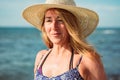 Beautiful portrait of middle aged woman on the beach Royalty Free Stock Photo