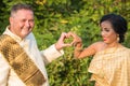 Beautiful portrait of a multi cultural wedding couple Royalty Free Stock Photo