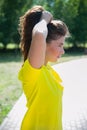 Beautiful portrait of sport woman touching her long hairs Royalty Free Stock Photo