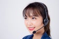Beautiful portrait young asian business woman customer service job call center in headset isolated on white background Royalty Free Stock Photo