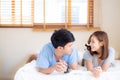 Beautiful portrait young asian couple relax and satisfied together in bedroom at home Royalty Free Stock Photo